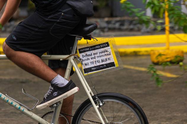 Cyclists Protest US-Led Pax Silica Initiative MANILA, PHILIPPINES - OCTOBER 12, 2026: A bike ride was led by local cyclists, along with environmental advocates, in condemnation of the US-led Pax Silica Initiative that participants say will destroy the livelihoods of local farming communities, displace local indigenous communities, and consume tremendous amounts of water that would have otherwise be utilized by local Filipinos. The route started in the Quezon City Hall and ended in the Bonifacio Shrine where the closing program was held with each sector that participated in the bike ride expressing their message of solidarity to the cause. Multiple stops where held in front of the office of the Department of Environment and Natural Resources Copyright: x xCharlesxEdmonxS.xPerezx xJNAxPressx