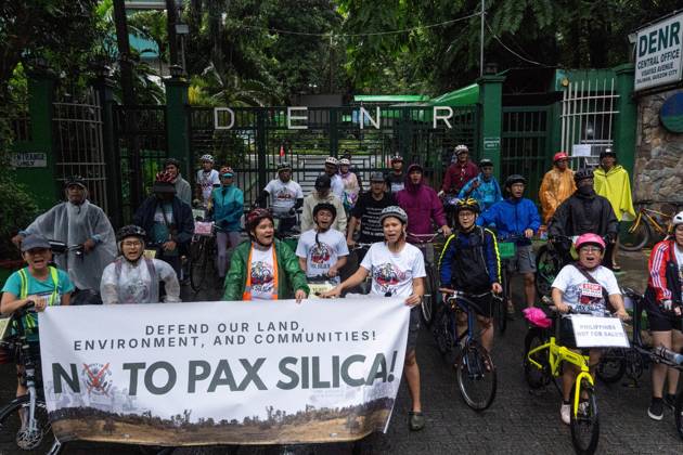 Cyclists Protest US-Led Pax Silica Initiative MANILA, PHILIPPINES - OCTOBER 12, 2026: A bike ride was led by local cyclists, along with environmental advocates, in condemnation of the US-led Pax Silica Initiative that participants say will destroy the livelihoods of local farming communities, displace local indigenous communities, and consume tremendous amounts of water that would have otherwise be utilized by local Filipinos. The route started in the Quezon City Hall and ended in the Bonifacio Shrine where the closing program was held with each sector that participated in the bike ride expressing their message of solidarity to the cause. Multiple stops where held in front of the office of the Department of Environment and Natural Resources Copyright: x xCharlesxEdmonxS.xPerezx xJNAxPressx