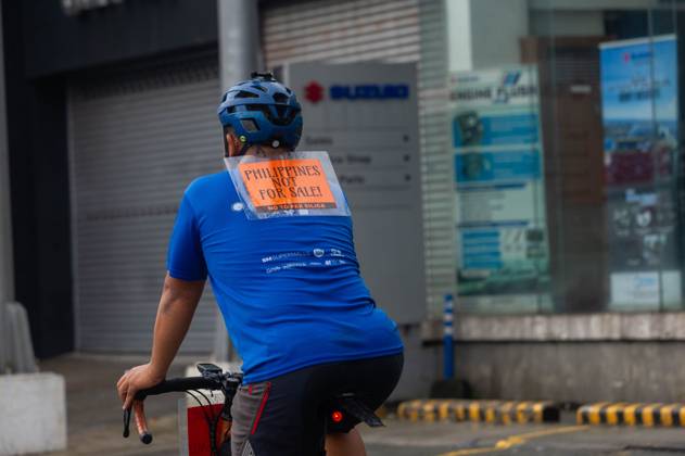 Cyclists Protest US-Led Pax Silica Initiative MANILA, PHILIPPINES - OCTOBER 12, 2026: A bike ride was led by local cyclists, along with environmental advocates, in condemnation of the US-led Pax Silica Initiative that participants say will destroy the livelihoods of local farming communities, displace local indigenous communities, and consume tremendous amounts of water that would have otherwise be utilized by local Filipinos. The route started in the Quezon City Hall and ended in the Bonifacio Shrine where the closing program was held with each sector that participated in the bike ride expressing their message of solidarity to the cause. Multiple stops where held in front of the office of the Department of Environment and Natural Resources Copyright: x xCharlesxEdmonxS.xPerezx xJNAxPressx