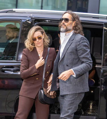 October 12, 2026, London, England, United Kingdom: RUSSELL BRAND with his wife LAURA arrives at Southwark Crown Court, where he is facing three charges of rape, indecent assault, and three counts of sexual assault, relating to six women. London United Kingdom - ZUMAs262 20261012_zip_s262_001 Copyright: xTayfunxSalcix