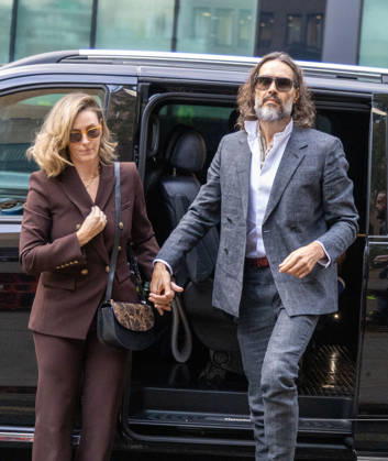 October 12, 2026, London, England, United Kingdom: RUSSELL BRAND with his wife LAURA arrives at Southwark Crown Court, where he is facing three charges of rape, indecent assault, and three counts of sexual assault, relating to six women. London United Kingdom - ZUMAs262 20261012_zip_s262_004 Copyright: xTayfunxSalcix
