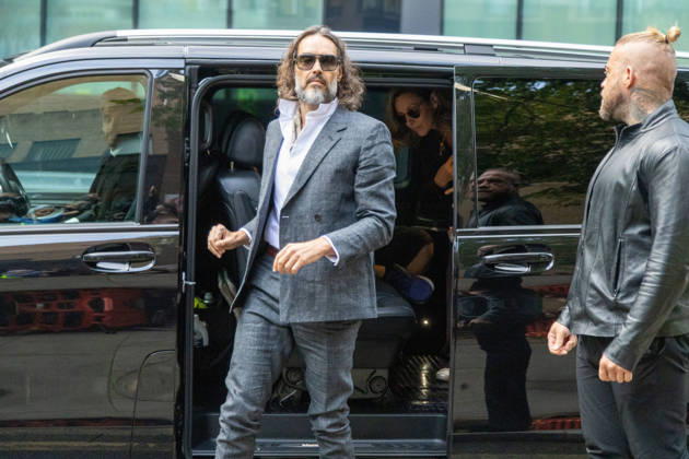 October 12, 2026, London, England, United Kingdom: RUSSELL BRAND arrives at Southwark Crown Court, where he is facing three charges of rape, indecent assault, and three counts of sexual assault, relating to six women. London United Kingdom - ZUMAs262 20261012_zip_s262_006 Copyright: xTayfunxSalcix