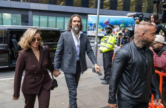 October 12, 2026, London, England, United Kingdom: RUSSELL BRAND with his wife LAURA arrives at Southwark Crown Court, where he is facing three charges of rape, indecent assault, and three counts of sexual assault, relating to six women. London United Kingdom - ZUMAs262 20261012_zip_s262_021 Copyright: xTayfunxSalcix
