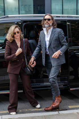 October 12, 2026, London, England, United Kingdom: Actor and comedian Russell BRAND arrives at Southwark Crown Court with his wife, Laura, in London, United Kingdom, on October 12, 2026, as his trial begins on charges of rape, sexual assault and indecent assault. BRAND has pleaded not guilty to all charges. London United Kingdom - ZUMAk172 20261012_zip_k172_007 Copyright: xThomasxKrychx