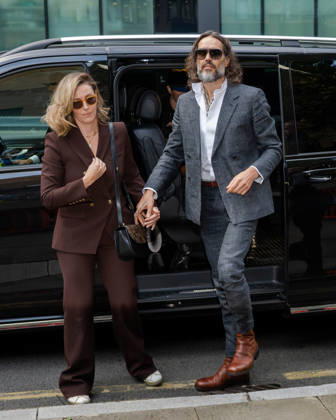 October 12, 2026, London, England, United Kingdom: Actor and comedian Russell BRAND arrives at Southwark Crown Court with his wife, Laura, in London, United Kingdom, on October 12, 2026, as his trial begins on charges of rape, sexual assault and indecent assault. BRAND has pleaded not guilty to all charges. London United Kingdom - ZUMAk172 20261012_zip_k172_009 Copyright: xThomasxKrychx
