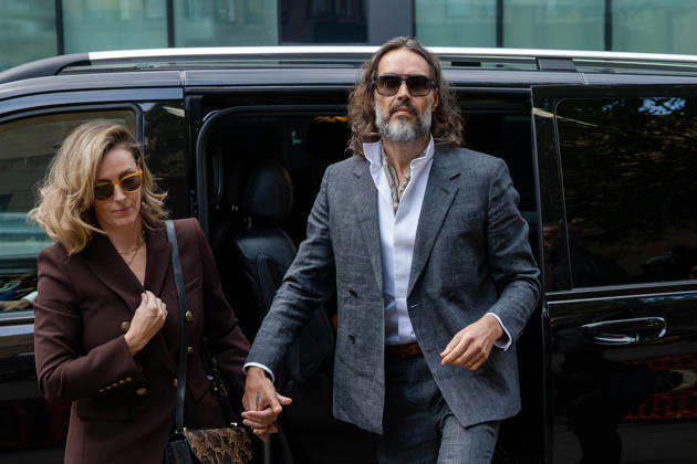 October 12, 2026, London, England, United Kingdom: Actor and comedian Russell BRAND arrives at Southwark Crown Court with his wife, Laura, in London, United Kingdom, on October 12, 2026, as his trial begins on charges of rape, sexual assault and indecent assault. BRAND has pleaded not guilty to all charges. London United Kingdom - ZUMAk172 20261012_zip_k172_011 Copyright: xThomasxKrychx