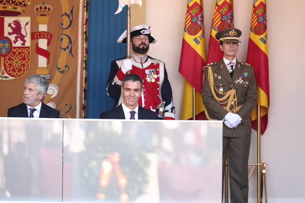 October 12 Parade for Hispanic Heritage Day: Interior Minister Fernando Grande Marlaska, and Prime Minister Pedro Sánchez, during the solemn ceremony honoring the national flag and the military parade for October 12, Hispanic Heritage Day, in Plaza de Cánovas del Castillo, on October 12, 2026, in Madrid, Spain. The events begin with the flag-raising ceremony and are followed by a tribute to those who gave their lives for the country. Subsequently, the military air and ground parades begin. Approximately 4,400 members of the Armed Forces, the security forces, and various civilian public institutions are participating this year in the parade presided over by the King and Queen. The aerial parade featured 50 fighter, training, and transport a Copyright: xEduardoxParrax 7840703