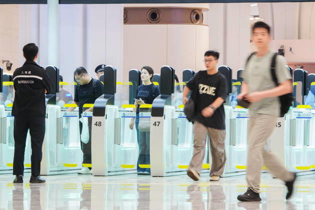 HONG KONG-DAILY HUANGGANG-PORT-OPENING Passengers arrive in Hong Kong through the redeveloped Huanggang Port on October 12, 2026, the first day of operations under the new collaborative inspection and joint clearance system. (Photo by Zulu Lo TMHK via Nexpher Images) Hong Kong
