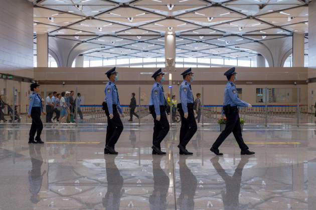Huanggang Port Opens Officers marching near the border control checkpoint to shenzhen in Huanggang Port on October 12, 2026 in Shenzhen, China. (Photo by STR Nexpher Images) SHENZHEN
