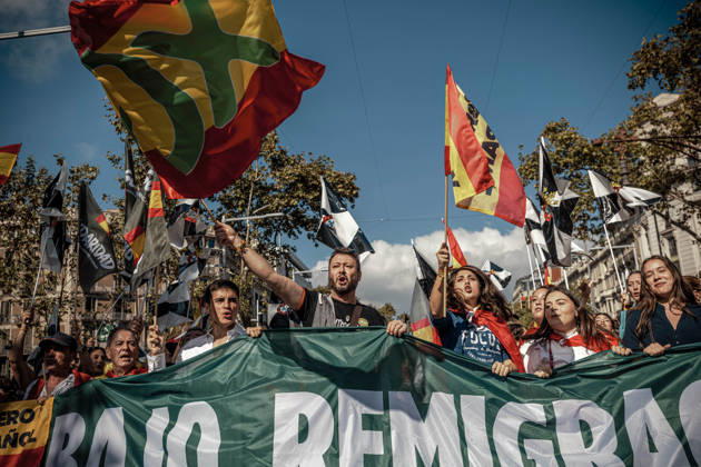 October 12, 2026, Barcelona, Catalonia, Spain: Demonstrators chant slogans behind a banner during a rally marking SpainÃ¢â‚¬â ¢s National Day. Barcelona Spain - ZUMAo105 20261012_fap_o105_007 Copyright: xMatthiasxOesterlex