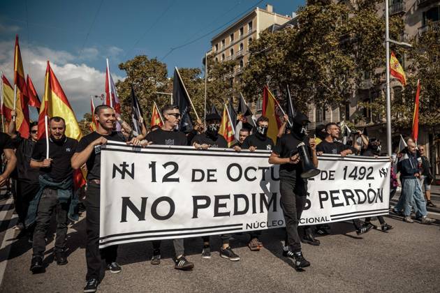 October 12, 2026, Barcelona, Catalonia, Spain: Demonstrators march behind a banner reading October 12, 1492: We do not ask for forgiveness. during a rally marking SpainÃ¢â‚¬â ¢s National Day Barcelona Spain - ZUMAo105 20261012_fap_o105_008 Copyright: xMatthiasxOesterlex