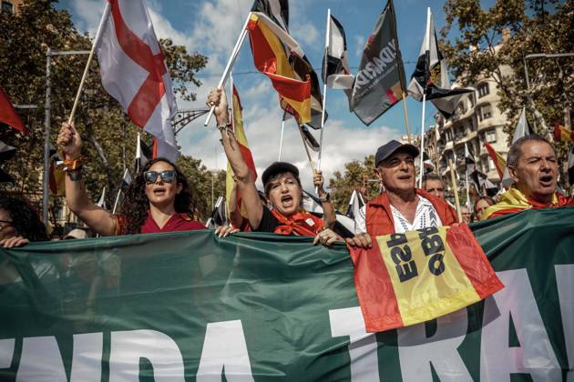 October 12, 2026, Barcelona, Catalonia, Spain: Demonstrators chant slogans behind a banner during a rally marking SpainÃ¢â‚¬â ¢s National Day. Barcelona Spain - ZUMAo105 20261012_fap_o105_030 Copyright: xMatthiasxOesterlex