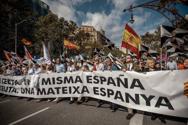 October 12, 2026, Barcelona, Catalonia, Spain: Demonstrators march behind a banner reading Catalonia with Ceuta. One Spain during a rally marking SpainÃ¢â‚¬â ¢s National Day. Barcelona Spain - ZUMAo105 20261012_fap_o105_033 Copyright: xMatthiasxOesterlex