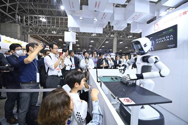 Japan showcases emerging technologies at CEATEC 2026 CHIBA, JAPAN - OCTOBER 13: Visitors explore technology exhibits during CEATEC 2026 at Makuhari Messe in Chiba, Japan, October 13, 2026. The four-day technology exhibition brings together 821 companies and organizations from Japan and abroad, showcasing innovations in artificial intelligence, robotics, digital technology and industrial solutions under the theme ÒTransformation.Ó David Mareuil Anadolu Chiba Japan. Editorial use only. Please get in touch for any other usage.  Copyright: x2026xAnadoluxDavidxMareuilx