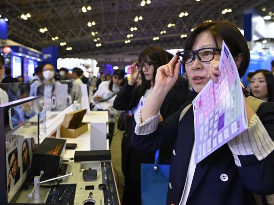 Japan showcases emerging technologies at CEATEC 2026 CHIBA, JAPAN - OCTOBER 13: Visitors explore technology exhibits during CEATEC 2026 at Makuhari Messe in Chiba, Japan, October 13, 2026. The four-day technology exhibition brings together 821 companies and organizations from Japan and abroad, showcasing innovations in artificial intelligence, robotics, digital technology and industrial solutions under the theme ÒTransformation.Ó David Mareuil Anadolu Chiba Japan. Editorial use only. Please get in touch for any other usage.  Copyright: x2026xAnadoluxDavidxMareuilx