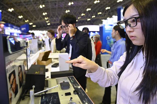 Japan showcases emerging technologies at CEATEC 2026 CHIBA, JAPAN - OCTOBER 13: Visitors explore technology exhibits during CEATEC 2026 at Makuhari Messe in Chiba, Japan, October 13, 2026. The four-day technology exhibition brings together 821 companies and organizations from Japan and abroad, showcasing innovations in artificial intelligence, robotics, digital technology and industrial solutions under the theme ÒTransformation.Ó David Mareuil Anadolu Chiba Japan. Editorial use only. Please get in touch for any other usage.  Copyright: x2026xAnadoluxDavidxMareuilx
