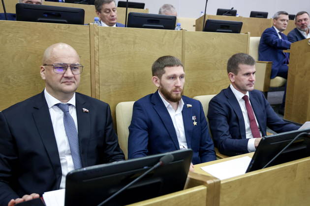 RUSSIA, MOSCOW - OCTOBER 13, 2026: Russian State Duma members Oleg Garin, Denis Portnyagin and Gennady Panin (L-R) attend a plenary meeting of the Russian State Duma. Russian State Duma Press Office TASS  99238616