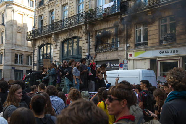 High School Stdent Mobilisation - Bordeaux Protesters gathered on a vehicle hold up placards and a smoke flare emitting black smoke during Act V of the high school student mobilisation in Bordeaux, France on October 13, 2026. Photo by Fabrice Sapte ABACAPRESS.COM Bordeaux France  Copyright: xSaptexFabrice ABACAx