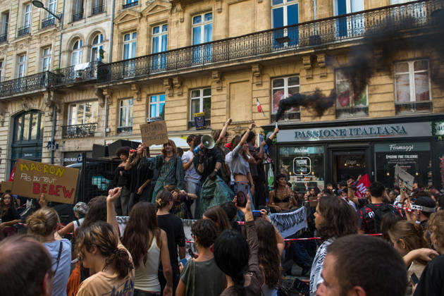 High School Stdent Mobilisation - Bordeaux Protesters gathered on a vehicle hold up placards and a smoke flare emitting black smoke during Act V of the high school student mobilisation in Bordeaux, France on October 13, 2026. Photo by Fabrice Sapte ABACAPRESS.COM Bordeaux France  Copyright: xSaptexFabrice ABACAx