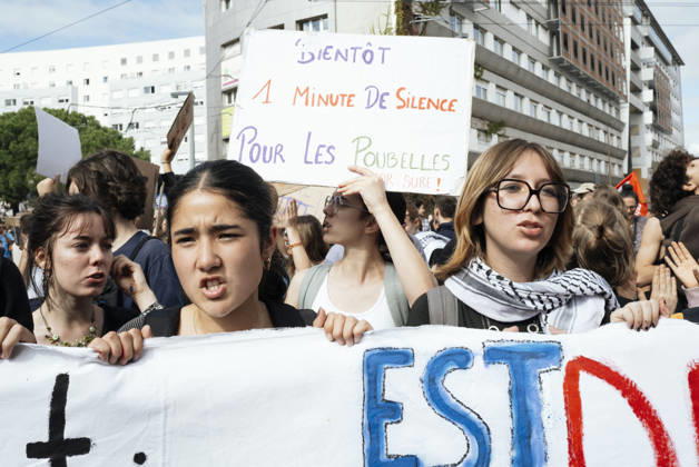 High School Student Mobilisation - Toulouse Schoolgirls standing behind a banner holding a placard reading - Soon, a minute’s silence for the rubbish bins. Act V of the secondary school and university students protests. Young people and the world of work are continuing their joint mobilisation and demands for adequate resources for education, better study conditions, an end to student precariousness, and access to housing. France, Toulouse, 13 October 2026. Photo by Patricia Huchot-Boissier AbacaPress.com. TOULOUSE OCCITANIE France  Copyright: xHuchot-BoissierxPatricia ABACAx