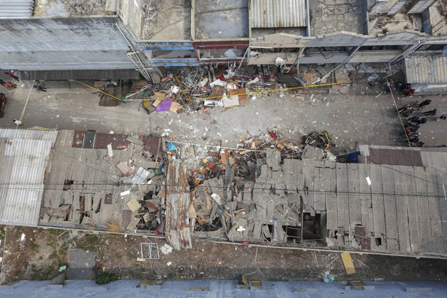 Blast at Indonesian market kills 2, injures 11 in South Tangerang BANTEN, INDONESIA - OCTOBER 15: An aerial view shows damaged shop-house buildings and debris scattered across the site of an explosion at a market in South Tangerang, on the outskirt of Jakarta, Indonesia, on October 15, 2026. The blast killed two people and injured at least 11 others, according to police. Investigators are examining the cause of the explosion after finding an ethylene gas cylinder at the site. The blast damaged shop-house buildings and scattered debris across the surrounding commercial area. Agoes Rudianto Anadolu Banten Indonesia. Editorial use only. Please get in touch for any other usage.  Copyright: x2026xAnadoluxAgoesxRudiantox