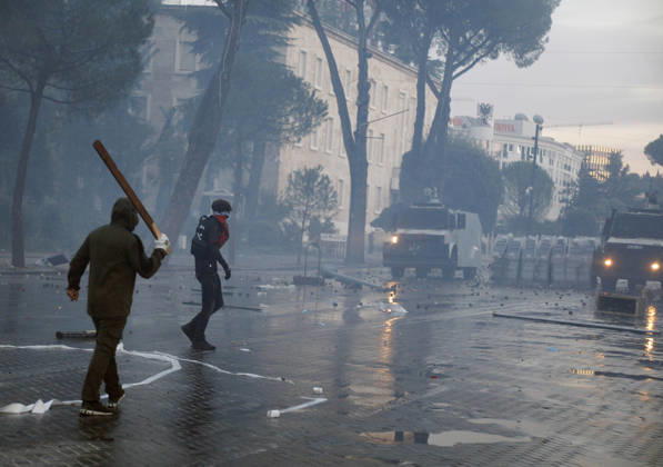 Protesters Clash with Police During a Demonstration in Tirana, Albania. Protesters throw stones at riot police during an anti-government demonstration in central Tirana on October 15, 2026, as protests continued for a third consecutive day over university conditions and demands for the resignation of Albanian Prime Minister Edi Rama. The latest rally follows two nights of violence in the capital, during which protesters and riot police clashed, police used water cannons and tear gas, and demonstrators damaged government offices and shops and set fire to several buildings. Light Studio Agency Malton Dibra Tirana Albania Copyright: xLightxStudioxAgencyx xMaltonxDibrax