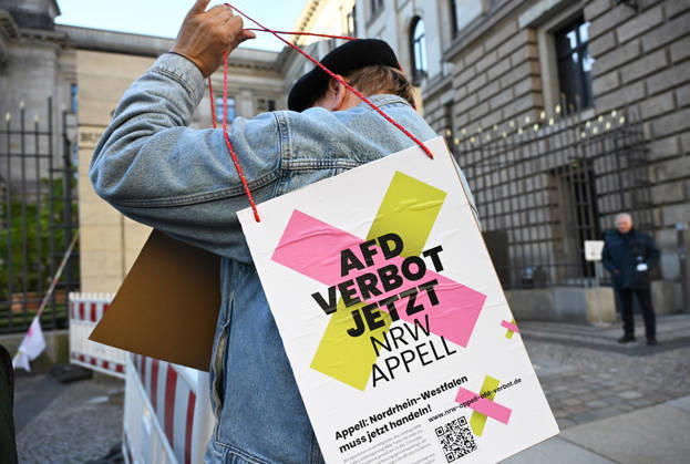 Rally calling for an AfD ban in Berlin BERLIN, GERMANY - OCTOBER 16: People take part in a rally near the Bundesrat calling for proceedings to ban the far-right Alternative for Germany (AfD) party and urge North Rhine-Westphalia Minister-President Hendrik Wüst to support their demand, as he is set to be elected President of the Bundesrat that day, in Berlin, Germany, on 16 October 2026. The rally is organized by the alliance NRW Appeal: AfD Ban Now, which reportedly collected more than 120,000 signatures in support of an AfD ban in North Rhine-Westphalia and is urging the Bundesrat to initiate proceedings before the Federal Constitutional Court to ban the party. Volodymyr Sindieiev Anadolu Berlin Germany. Editorial use only. Please get  Copyright: x2026xAnadoluxVolodymyrxSindieievx