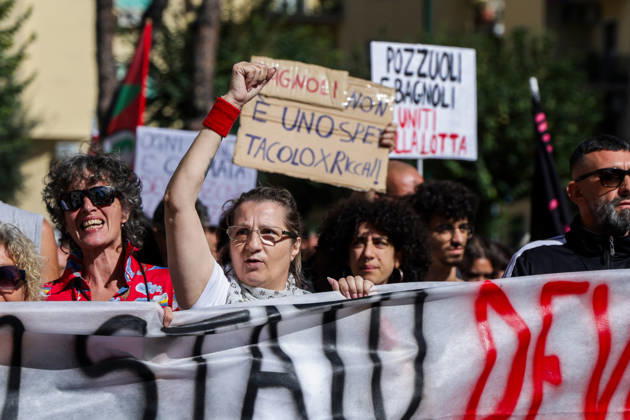 IPA89763001 - NAPLES, ITALY — OCTOBER 16, 2026: Environmental activists, students, and unemployed people take to the streets in the Bagnoli district of Naples to protest the municipal administration’s handling of the environmental remediation of the former Italsider steelworks site. The demonstration focuses on the ongoing redevelopment work in the area, where facilities for the 38th Louis Vuitton America’s Cup—scheduled to take place in Naples in 2027—are being built. Protesters raise concerns about environmental protection, the remediation process, and the project’s impact on the local community.  Copyright: xAntonioxBalasco LiveMediax xAntonioxBalasco LiveMediax IPA89763001