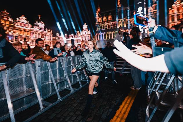 Belgian singer Angele pictured during the Angele Instinct Release Party , a surprise party organized by the Brussels singer to celebrate the release of her album Instinct at the Grote Markt Grand Place, in Brussels, Friday 16 October 2026.  EMILExWINDAL 190036474