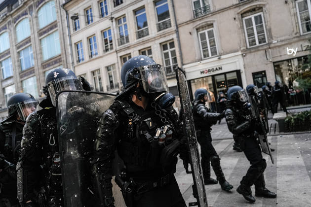 French police intervene in Nancy protests against rising living costs NANCY, FRANCE - OCTOBER 17: French riot police officers deploy tear gas to disperse demonstrators clashing with law enforcement during a nationwide protest over rising living costs, fuel prices, and education funding in Nancy, France on Saturday, October 17, 2026. Clashes broke out after groups of youth set up street barricades around secondary schools and central thoroughfares, prompting police units to intervene with crowd-control canisters to reopen urban transit corridors. Muhammed Said Tako Anadolu Nancy France. Editorial use only. Please get in touch for any other usage.  Copyright: x2026xAnadoluxMuhammedxSaidxTakox
