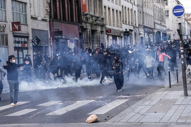 French police intervene in Nancy protests against rising living costs NANCY, FRANCE - OCTOBER 17: French riot police officers deploy tear gas to disperse demonstrators clashing with law enforcement during a nationwide protest over rising living costs, fuel prices, and education funding in Nancy, France on Saturday, October 17, 2026. Clashes broke out after groups of youth set up street barricades around secondary schools and central thoroughfares, prompting police units to intervene with crowd-control canisters to reopen urban transit corridors. Muhammed Said Tako Anadolu Nancy France. Editorial use only. Please get in touch for any other usage.  Copyright: x2026xAnadoluxMuhammedxSaidxTakox