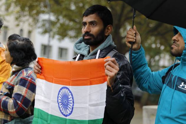 October 17, 2026, Berlin, Germany: BERLIN, GERMANY - OCTOBER 17, 2026: A small group of demonstrators hold placards at Oranienplatz in the Kreuzberg district to show solidarity with mass protests in India and to protest against the crackdown on them, as several people take the floor to discuss the situation. The demonstration followed a call by Neha Bora, president of the All India Studentsâ€⠢ Association (AISA), for people everywhere to back the protests, saying â€oeeverywhere is Jantar Mantarâ€Â, the site in Delhi where the main protests are taking place. The protests demand the resignation of Chief Election Commissioner Gyanesh Kumar over a revision of electoral rolls that opponents say led to the mass deletion of voters, whi - ZUMAq101 20261017_zna_q101_071 Copyright: xAlessiaxCoccax