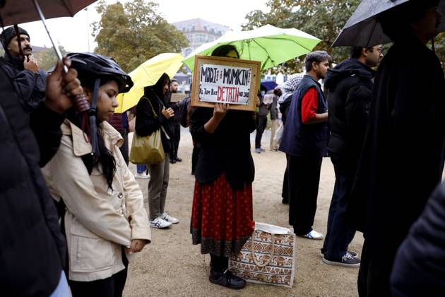 October 17, 2026, Berlin, Germany: BERLIN, GERMANY - OCTOBER 17, 2026: A small group of demonstrators hold placards at Oranienplatz in the Kreuzberg district to show solidarity with mass protests in India and to protest against the crackdown on them, as several people take the floor to discuss the situation. The demonstration followed a call by Neha Bora, president of the All India Studentsâ€⠢ Association (AISA), for people everywhere to back the protests, saying â€oeeverywhere is Jantar Mantarâ€Â, the site in Delhi where the main protests are taking place. The protests demand the resignation of Chief Election Commissioner Gyanesh Kumar over a revision of electoral rolls that opponents say led to the mass deletion of voters, whi - ZUMAq101 20261017_zna_q101_074 Copyright: xAlessiaxCoccax