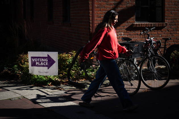 October 17, 2026, Port Moody, Bc, CANADA: A woman walks past a sign directing people to a polling station in Vancouver, on Saturday Oct. 17, 2026. British Columbians are heading to the polls to cast their votes in municipal elections being held across the province. Port Moody CANADA  - ZUMAc35_ 20261017_zaf_c35_020 Copyright: xEthanxCairnsx