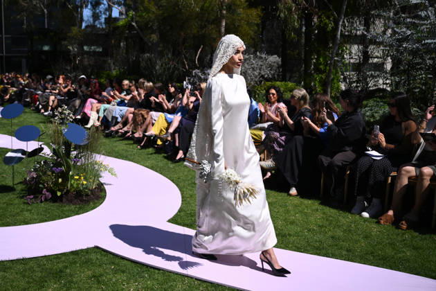 MELBOURNE FASHION WEEK PREVIEW, A model walks the runway during a 2026 Melbourne Fashion Week Runway Preview, at Sky Park, Melbourne, Monday, October 19, 2026. The preview features a selection of the upcoming collections that will appear on M FW runways including designers OUT OF HAND x Lisa Waup, Ebony Noire, Van Ermel Scherer, Perple, Gotham, Wilson Jedd Adams, Asiyam, Atoir, NGALI, Kuwaii, HoMie, Collective Closets x Mariam Farah, TOJHÃÄ, Amy Cottrell, BAAQIY and Sean Rentero. ( NO ARCHIVING MELBOURNE VICTORIA Australia Copyright: xJOELxCARRETTx 20261019154393995090