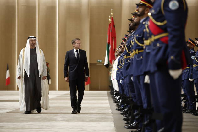 President Macron Visit To Middle East - Abu Dhabi Sheikh Mohamed bin Zayed Al Nahyan, President of the United Arab Emirates (UAE), and French President Emmanuel Macron review troops upon Macron s arrival at Zayed International Airport in Abu Dhabi, United Arab Emirates, October 19, 2026. Photo by Benoit Tessier Pool ABACAPRESS.COM Abu Dhabi United Arab Emirates Copyright: xTessierxBenoit Pool ABACAx