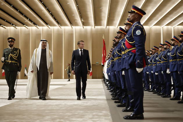 President Macron Visit To Middle East - Abu Dhabi Sheikh Mohamed bin Zayed Al Nahyan, President of the United Arab Emirates (UAE), and French President Emmanuel Macron review troops upon Macron s arrival at Zayed International Airport in Abu Dhabi, United Arab Emirates, October 19, 2026. Photo by Benoit Tessier Pool ABACAPRESS.COM Abu Dhabi United Arab Emirates Copyright: xTessierxBenoit Pool ABACAx