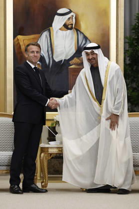 President Macron Visit To Middle East - Abu Dhabi French President Emmanuel Macron shakes hands with Sheikh Mohamed bin Zayed Al Nahyan, President of the United Arab Emirates (UAE), during a meeting at Qasr Al Watan presidential palace in Abu Dhabi, United Arab Emirates, October 19, 2026. Photo by Benoit Tessier Pool ABACAPRESS.COM Abu Dhabi United Arab Emirates Copyright: xTessierxBenoit Pool ABACAx