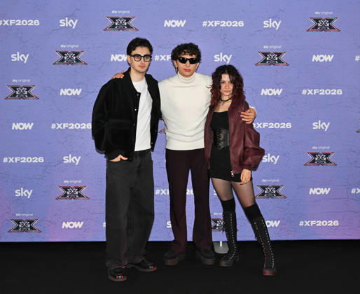 IPA89927939 - Milan, Italy: X Factor 2026 photocall featuring the 12 official contestants IRAMA S TEAM In the photo: Le Distanze (Andrea Manuel Pagella, Saverio Campese, Corinna Lanari)  Copyright: xNickxZonnax xNickxZonnax IPA89927939