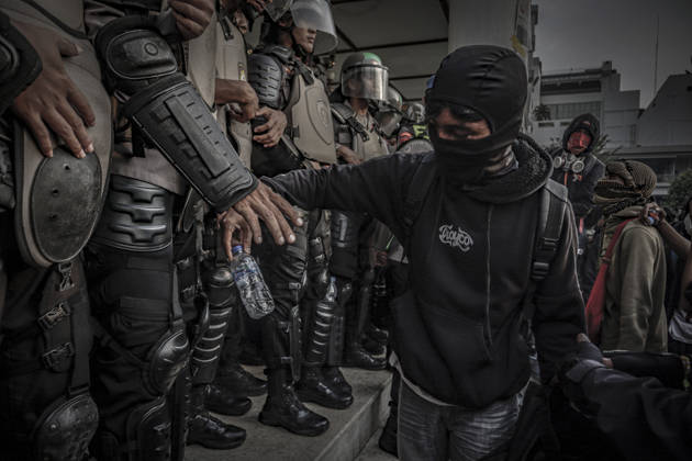 October 20, 2026, Yogyakarta, Special Region Of Yogyakarta, Indonesia: Special Region of Yogyakarta, October 20, 2026. A crowd comprising members of a community and student alliance staged a protest in front of the Special Region of Yogyakarta Regional People™s Representative Council (DPRD) building. During the protest, the demonstrators made several demands, including that forest and land fires and floods be declared national disasters; that strict action be taken against the corporations involved; and that the cost of education and healthcare be reduced and access to these services be made more equitable. Yogyakarta Indonesia - ZUMAf198 20261020_zip_f198_004 Copyright: xMuhammadxFebriansyahx
