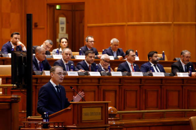 (261020) -- BUCHAREST, Oct. 20, 2026 -- Romanian Prime Minister designate Luca Niculescu delivers a speech during a confidence vote session at Parliament in Bucharest, Romania, Oct. 20, 2026. Romanian parliament approved Luca Niculescu s government on Tuesday, ending a political crisis that has lasted nearly six months. According to Romania s national news agency Agerpres, of 338 valid votes cast, 280 lawmakers voted in favor of the government s investiture while 58 voted against. (Photo by Xinhua) ROMANIA-BUCHAREST-PARLIAMENT-GOVERNMENT-APPROVAL CristianxCristel 