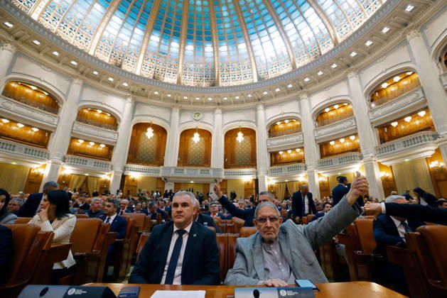 (261020) -- BUCHAREST, Oct. 20, 2026 -- Members of Romanian parliament attend a confidence vote session for Prime Minister designate Luca Niculescu s government in Bucharest, Romania, Oct. 20, 2026. Romanian parliament approved Luca Niculescu s government on Tuesday, ending a political crisis that has lasted nearly six months. According to Romania s national news agency Agerpres, of 338 valid votes cast, 280 lawmakers voted in favor of the government s investiture while 58 voted against. (Photo by Xinhua) ROMANIA-BUCHAREST-PARLIAMENT-GOVERNMENT-APPROVAL CristianxCristel 