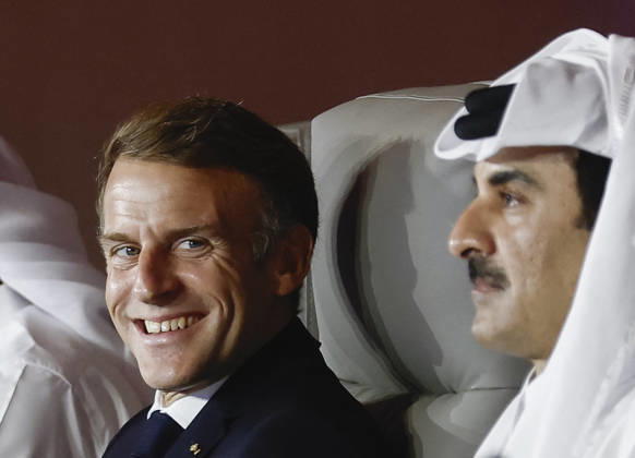 President Macron At The Opswf Summit During His Visit To Qatar French President Emmanuel Macron smiles while sitting next to Qatar s Emir Sheikh Tamim bin Hamad Al Thani as they attend the 9th Annual One Planet Sovereign Wealth Funds (OPSWF) Summit at the Rosewood Hotel in Lusail, Qatar, October 21, 2026. Photo by Benoit Tessier Pool ABACAPRESS.COM Lusail Qatar  Copyright: xTessierxBenoit Pool ABACAx