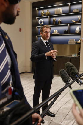 President Macron At The Opswf Summit During His Visit To Qatar French President Emmanuel Macron speaks to members of the media on the day of the 9th Annual One Planet Sovereign Wealth Funds (OPSWF) Summit, in Lusail, Qatar, October 21, 2026. Photo by Benoit Tessier Pool ABACAPRESS.COM Lusail Qatar  Copyright: xTessierxBenoit Pool ABACAx