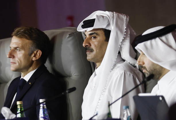 President Macron At The Opswf Summit During His Visit To Qatar Qatar s Emir Sheikh Tamim bin Hamad Al Thani reacts alongside French President Emmanuel Macron as they attend the 9th Annual One Planet Sovereign Wealth Funds (OPSWF) Summit at the Rosewood Hotel in Lusail, Qatar, October 21, 2026. Photo by Benoit Tessier Pool ABACAPRESS.COM Lusail Qatar  Copyright: xTessierxBenoit Pool ABACAx