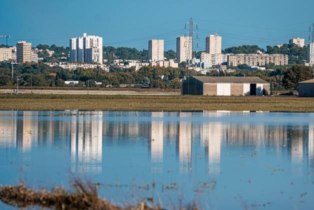 FLOODING IN THE GARD PHOTOPQR LE MIDI LIBRE MiKAEL ANISSET NIMES 10 21 2026 GARD OCTOBER 21, 2026 THE DAY AFTER THE FLOODING MEDITERRANEAN WEATHER EVENT SEVERE WEATHER THE Nîmes Plain in the Background, the Pissevin Towers Nîmes, France, October 21, 2026 Flooding following heavy rainfall has affected several areas of the city after the Vistre River overflowed its banks NÎMES GARD France  Copyright: xPHOTOPQR LExMIDIxLIBRE MAXPPPxMiKAELxANISSETx 20261021MDL8836 20261021MDL8836