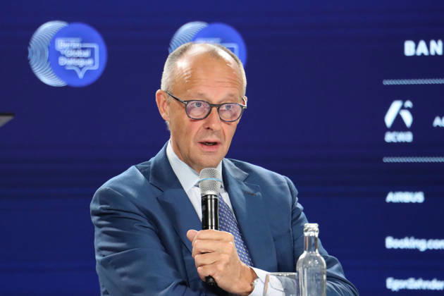 (261021) -- BERLIN, Oct. 21, 2026 -- German Chancellor Friedrich Merz speaks during the Berlin Global Dialogue in Berlin, Germany, Oct. 21, 2026. German Chancellor Friedrich Merz said on Wednesday that the European Union (EU) needs to protect its industries against unfair competition while keeping its markets open and avoiding a trade war. ) GERMANY-BERLIN-MERZ-BERLIN GLOBAL DIALOGUE LixHanlin 