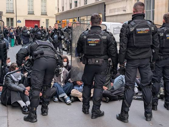 Students stage sit-in protest at Sciences Po Paris PARIS, FRANCE - OCTOBER 22: French gendarmerie officers form a security cordon as students stage a protest at Sciences Po Paris in Paris, France, on October 22, 2026. Officers holding riot shields face a crowd of protesters gathered on a street near the institution. Luc Auffret Anadolu Paris France. Editorial use only. Please get in touch for any other usage.  Copyright: x2026xAnadoluxLucxAuffretx