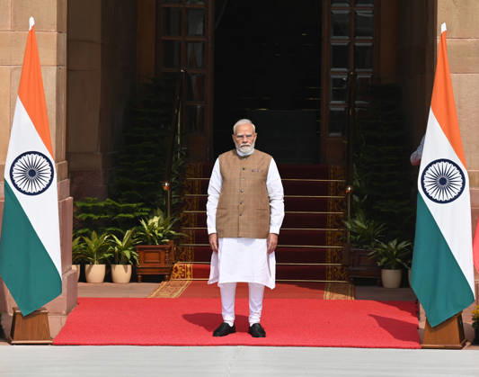 NEW DELHI, INDIA - OCTOBER 22: Prime Minister Narendra Modi waits to welcome Prime Minister of Poland, Donald Tusk (not in the picture) prior to their delegation-level bilateral meeting and joint press statement at Hyderabad House on October 22, 2026 in New Delhi, India. The high-level meeting marked Polish Prime Minister Tusk s official visit to India from October 21-23, 2026 his first visit to the country as Prime Minister since 2010 aimed at advancing the India-Poland Strategic Partnership and deepening India-EU strategic ties. During wide-ranging discussions, both leaders reviewed bilateral cooperation across key sectors including trade, technology, defense-industrial collaboration, and energy, while reaffirming joint commitment toward