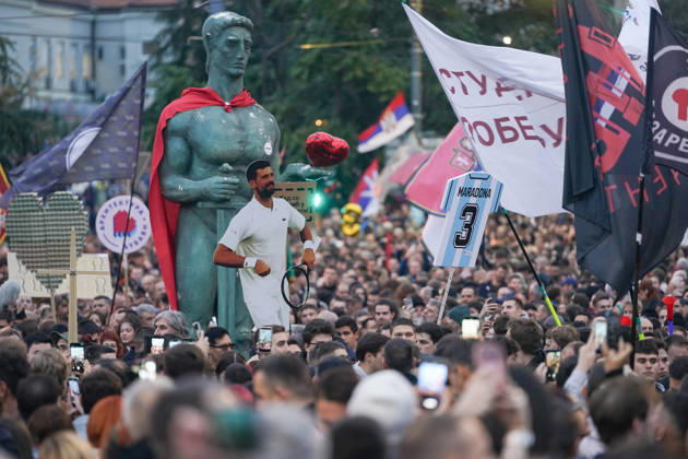 October 22, 2026, Belgrade, Central Serbia, Serbia: 20261022, Belgrade, Serbia - Supporters and members of the student protest movement ( Student List - Students Are Winning ) gather at Slavija Square for a massive final pre-election rally ahead of the upcoming parliamentary elections. Walkers and student columns from multiple cities across Serbia converged on the capital after days of marching, rallying under the slogan Victory Calls to mobilize voters before the electoral silence begins.Protesters carry a replica of the Pobednik (The Victor) monument, the symbol of Belgrade, along with a cardboard cutout of tennis player Novak Djokovic, who supports the students, and a sign shaped like a Diego Maradona jersey with the number 3, - ZUMAd223 20261022_zip_d223_016 Copyright: xMarkoxDimicx